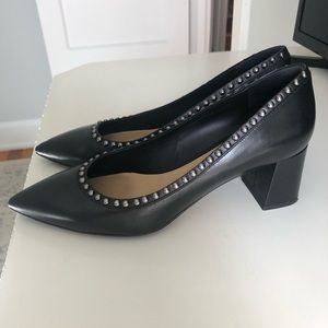 Select nailhead black leather pumps